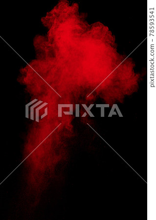 Red powder explosion cloud on black background. 78593541