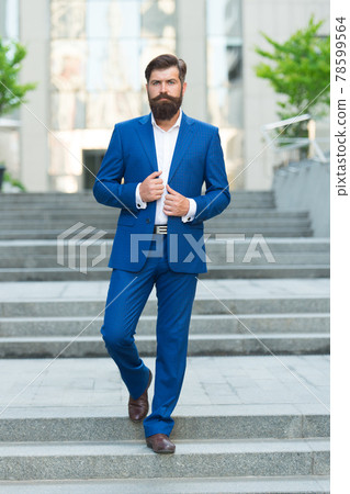 On his way to success. Walking down street. Mature On his way to success. Walking down street. Mature 78599564