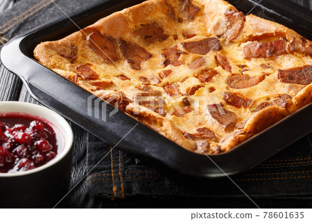 Oven Baked Swedish Bacon Pancake Flaskpannkaka close up in the baking dish . Horizontal 78601635
