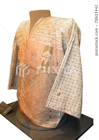 14. the talisman shirt with the names of Allah and the Koran on it dating back to the century 78603442