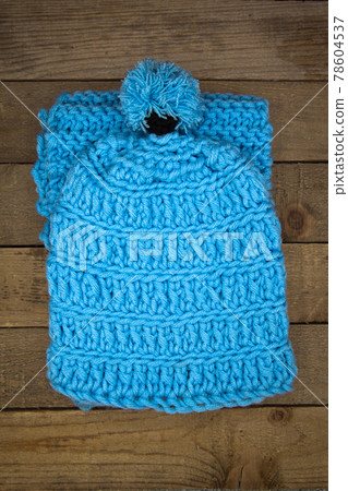 Handmade wool knitted winter blue hat and scarf 78604537