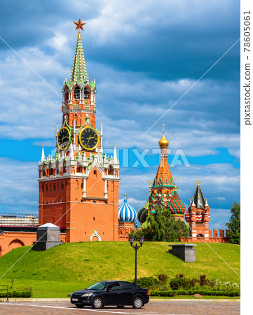 Moscow Kremlin in summer, Russia. Vertical scenic view of Spasskaya Tower and St Basil's Cathedral Moscow Kremlin in summer, Russia. Vertical scenic view of Spasskaya Tower and St Basil's Cathedral 78605061