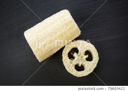 Loofah natural natural close-up on black background Loofah natural natural close-up on black background 78605422