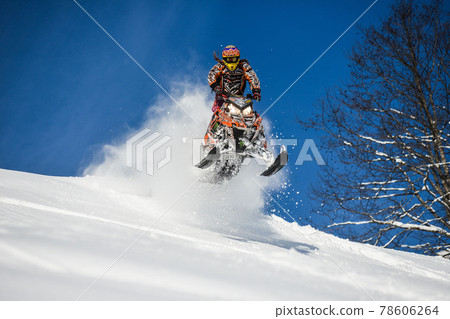 Sakhalin Island, Russian - January 23, 2015 : Bibikov moving snowmobile Sakhalin Island, Russian - January 23, 2015 : Bibikov moving snowmobile 78606264