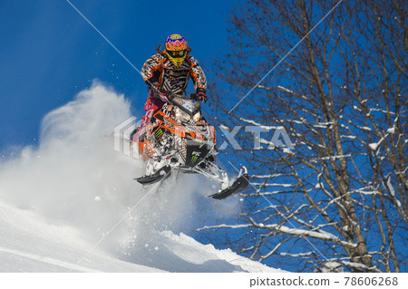 snowmobile , winter forest in the mountains snowmobile , winter forest in the mountains 78606268