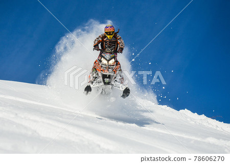 Sakhalin, Russian - January 23, 2015 : snowmobile in the mountains 78606270