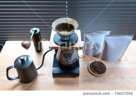 Hand drip coffee, Barista making drip coffee with mockup blank package coffee Alternative ways of brewing Coffee shop concept 78607098