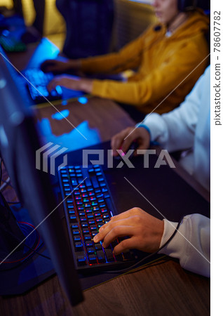 Two young gamers play in game club 78607782