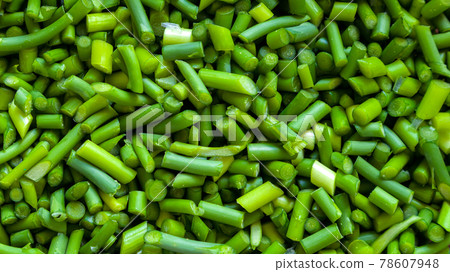 Garlic arrows, which are finely chopped and suitable for the background 78607948