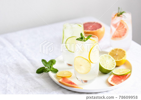 Glasses with cold citrus water. 78609958