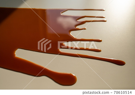 Cup of black coffee spilled on white work table. Cup of black coffee spilled on white work table. 78610514