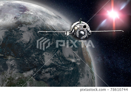 Spaceship flies above the planet Earth. Spaceship flies above the planet Earth. 78610744