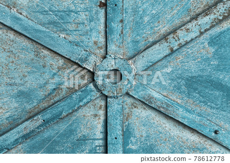 Close up view of old weathered metal door or gate - aged metal rusty texture background with copy space. Selective focus Close up view of old weathered metal door or gate - aged metal rusty texture background with copy space. Selective focus 78612778