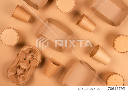 Flat lay composition with eco-friendly tableware and kraft paper food packaging on kraft paper background. Sustainable packaging concept, zero waste packaging. Mockup, selective focus 78612795