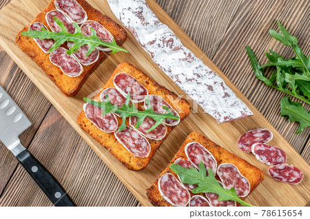 Toasts with fuet 78615654