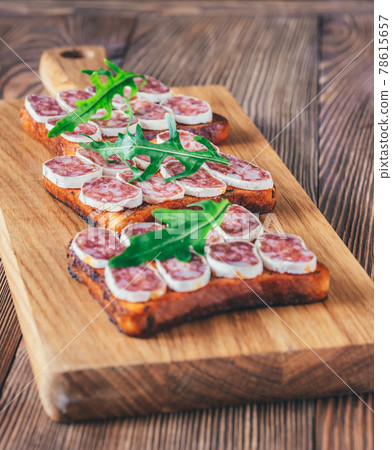Toasts with fuet Toasts with fuet 78615657