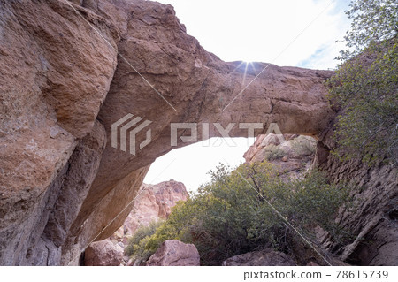 Beautiful nature arch on the El Dorado Trail Beautiful nature arch on the El Dorado Trail 78615739