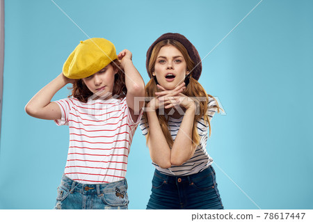 funny mom and daughter fashion studio lifestyle fun blue background family funny mom and daughter fashion studio lifestyle fun blue background family 78617447