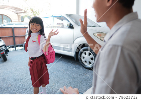Back to school. asian pupil with primary student uniform getting ready to school Back to school. asian pupil with primary student uniform getting ready to school 78623712