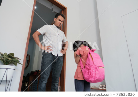 angry father confront his kid after school. 78623820