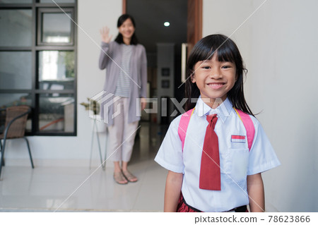 Back to school. asian pupil with primary student uniform getting ready to school Back to school. asian pupil with primary student uniform getting ready to school 78623866