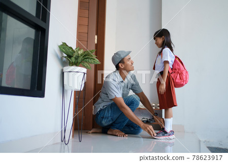 Back to school. asian pupil with primary student uniform getting ready to school Back to school. asian pupil with primary student uniform getting ready to school 78623917