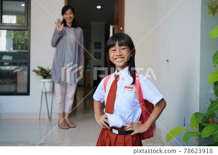 beautiful asian primary student going to school in the morning beautiful asian primary student going to school in the morning 78623918