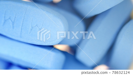 Rotating big blue medical pills closeup Rotating big blue medical pills closeup 78632124