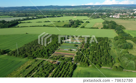 Bio farmer dron aerial field farming vegetable agricultural farm garden plantation fruit tree apple orchard video shot leaf curly cabbage kale plant organic plantation harvest vegetables, greenhouse Bio farmer dron aerial field farming vegetable agricultural farm garden plantation fruit tree apple orchard video shot leaf curly cabbage kale plant organic plantation harvest vegetables, greenhouse 78632780