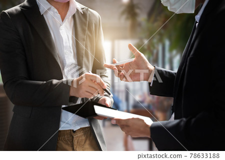Marketing staff are analyzing the data to business planning at office in the morning. Marketing staff are analyzing the data to business planning at office in the morning. 78633188