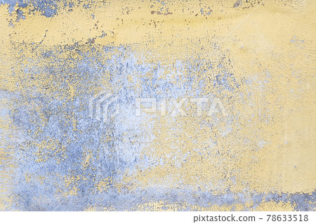 Old gray blue wall texture with peeling yellow paint background. Closeup. 78633518