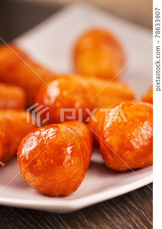 Neapolitan Baba Au Rum. High quality photo Neapolitan Baba Au Rum. High quality photo 78633907