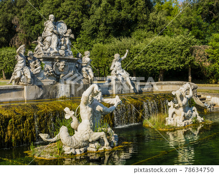Impressive view of the fountain of Ceres, magnificent sculptural composition made using Carrara marble and travertine, Royal Palace of Caserta, Italy Impressive view of the fountain of Ceres, magnificent sculptural composition made using Carrara marble and travertine, Royal Palace of Caserta, Italy 78634750