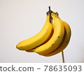 Hanging yellow banana 78635093