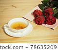 Afternoon tea with red roses and tea 78635209