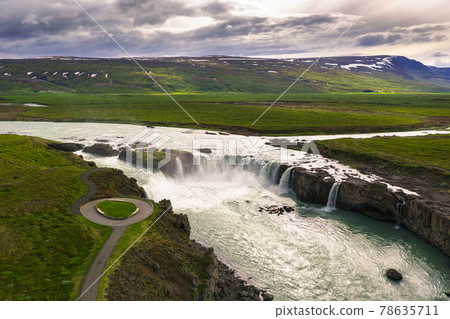 Aerial view of the Godafoss waterfall in Iceland with viewing area for tourists 78635711