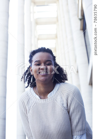 young pretty african girl posing cheerful on city background, lifestyle outdoor people concept young pretty african girl posing cheerful on city background, lifestyle outdoor people concept 78635790