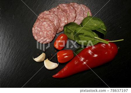 Italian pizza ingredients tomato basil garlic paprika salami Italian pizza ingredients tomato basil garlic paprika salami 78637197