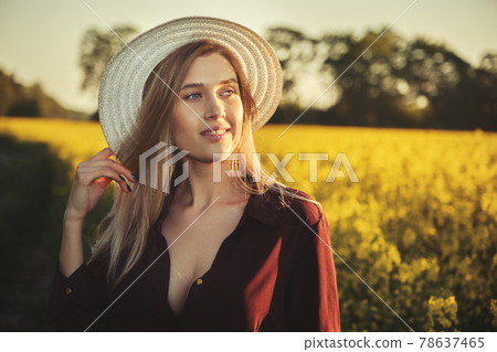 woman in a blooming field 78637465