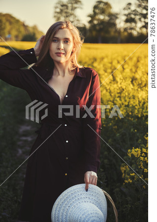 woman in a blooming field woman in a blooming field 78637476