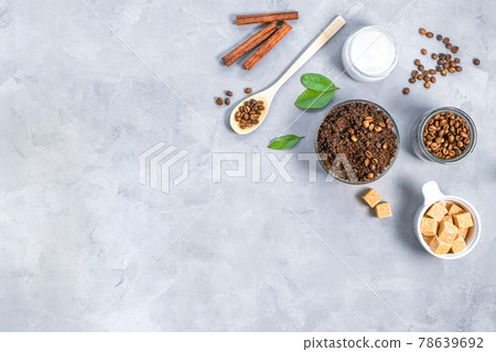 Homemade body scrub of ground coffee, sugar and coconut oil Homemade body scrub of ground coffee, sugar and coconut oil 78639692