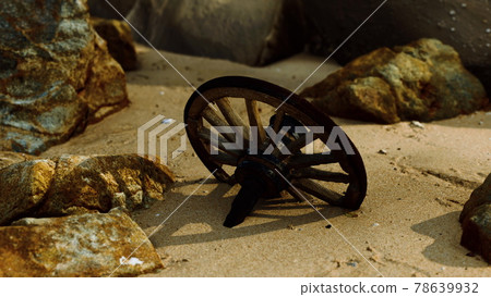 Old wooden cart wheel at sand beach 78639932