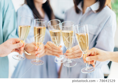 Young men and women toasting 78641529