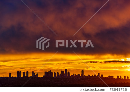 Metrotown on sunset cloudy sky background closer to the night 78641716