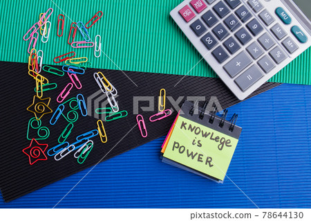 Knowledge is power concept top view flat lay. 78644130