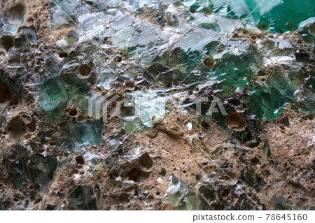 Textured glass rock detail abstract background Textured glass rock detail abstract background 78645160