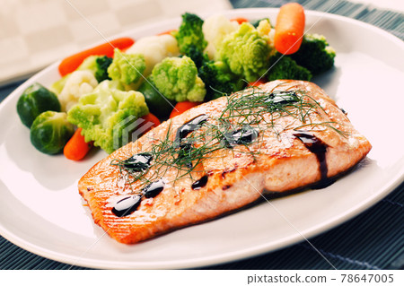 Salmon Fillet with Mixed Steamed Vegetables. High quality photo. Salmon Fillet with Mixed Steamed Vegetables. High quality photo. 78647005