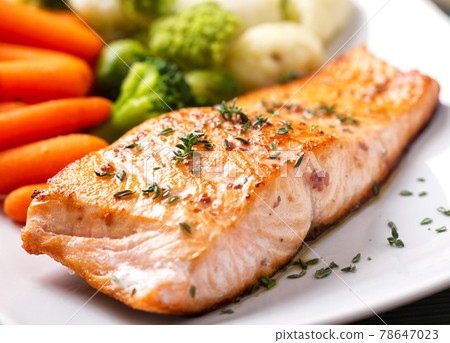 Salmon Fillet with Mixed Steamed Vegetables. High quality photo. Salmon Fillet with Mixed Steamed Vegetables. High quality photo. 78647023
