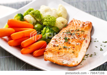 Salmon Fillet with Mixed Steamed Vegetables. High quality photo. Salmon Fillet with Mixed Steamed Vegetables. High quality photo. 78647108