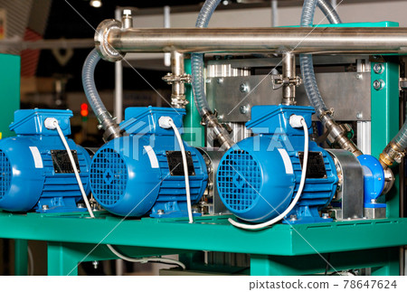 Electric motors in a production line to generate air pressure in a pipeline. Electric motors in a production line to generate air pressure in a pipeline. 78647624